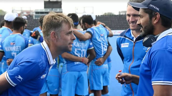 Coach discussing with players