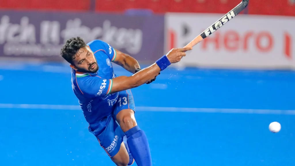 Harmanpreet Singh plays a precision pass on the field